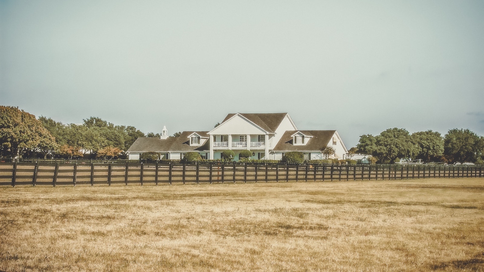 Scenic acreages for sale in Rocky View County Alberta – mountain views and open farmland